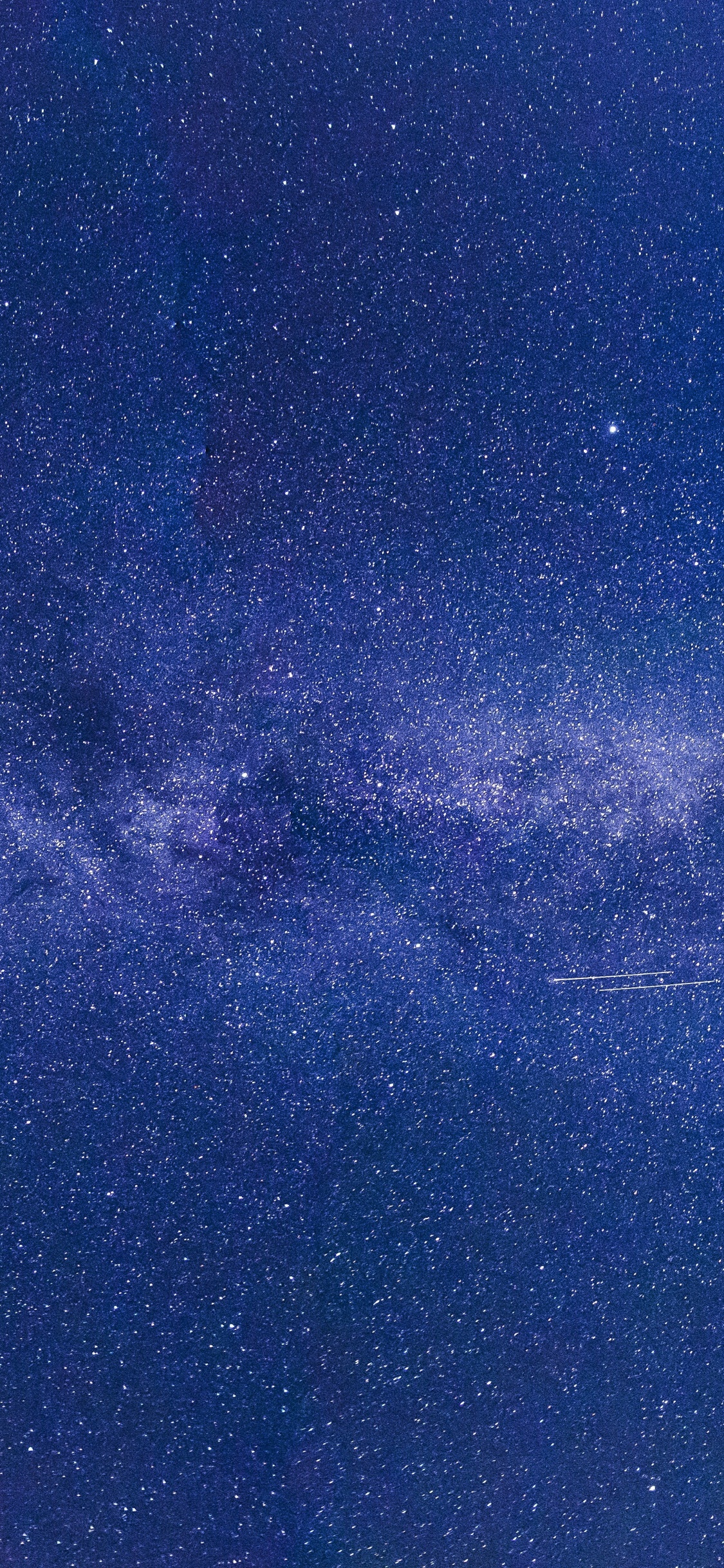 Blue and White Starry Night Sky. Wallpaper in 1125x2436 Resolution