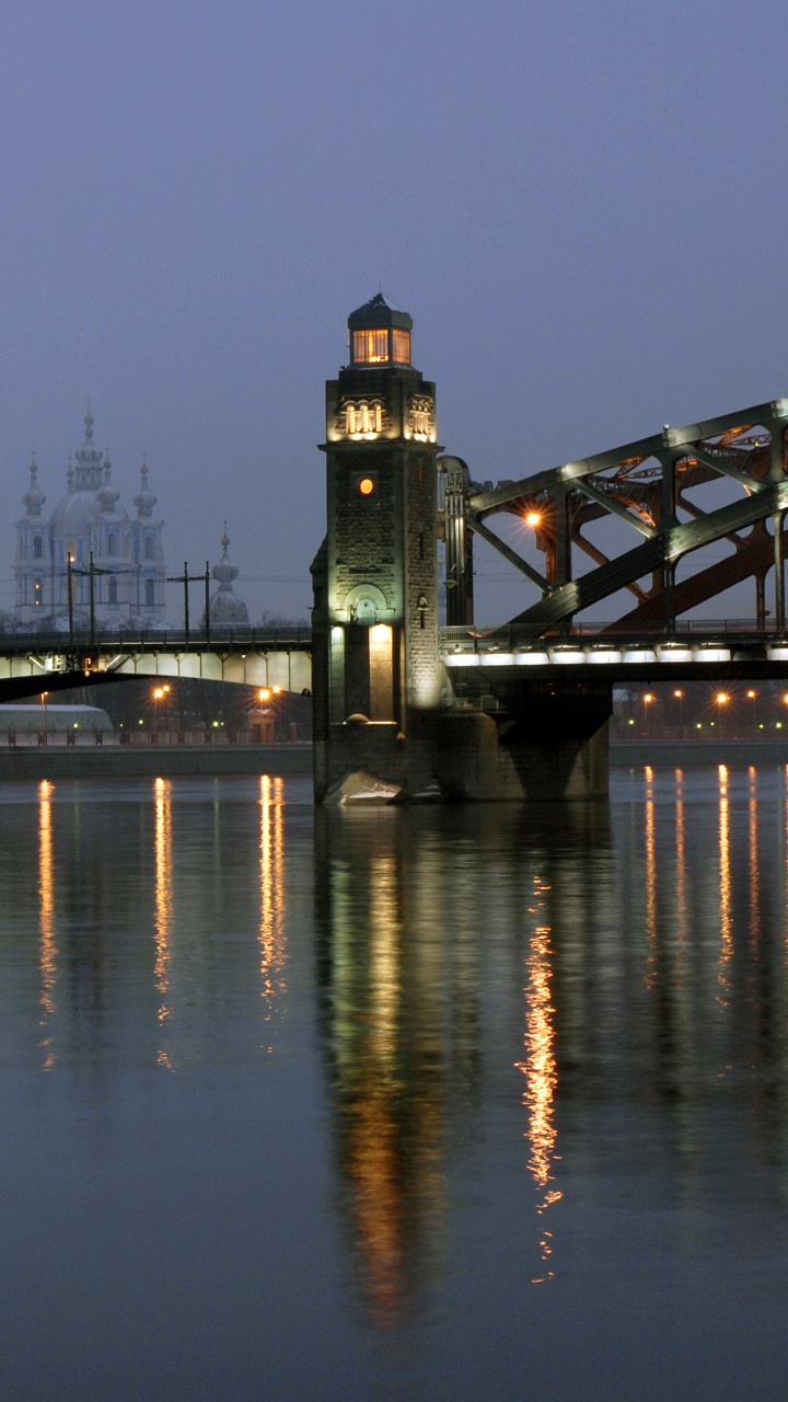 Bridge Over Water During Night Time. Wallpaper in 720x1280 Resolution