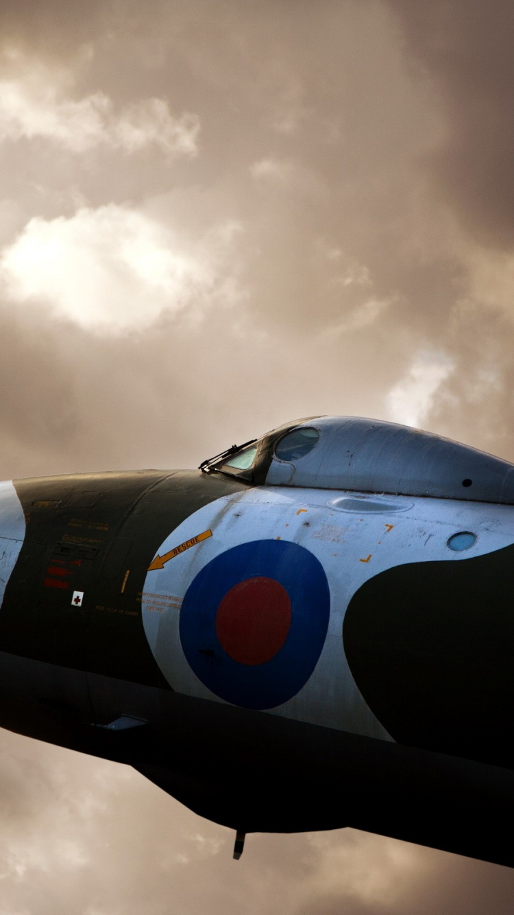 Black Jet Plane Under White Clouds During Daytime. Wallpaper in 750x1334 Resolution