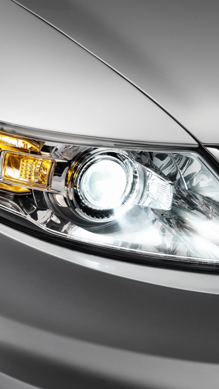 Silver Car With Yellow Light. Wallpaper in 750x1334 Resolution