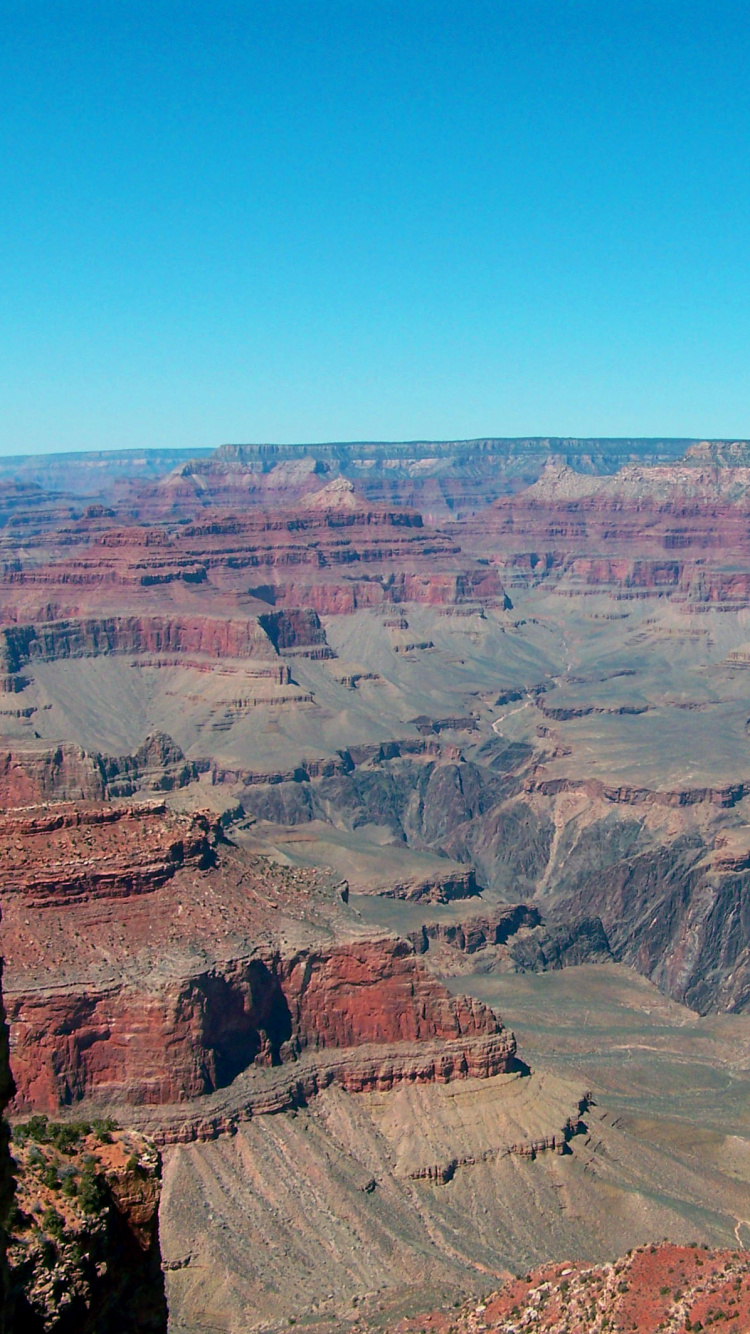 Brown Rock Formation Under Blue Sky During Daytime. Wallpaper in 750x1334 Resolution