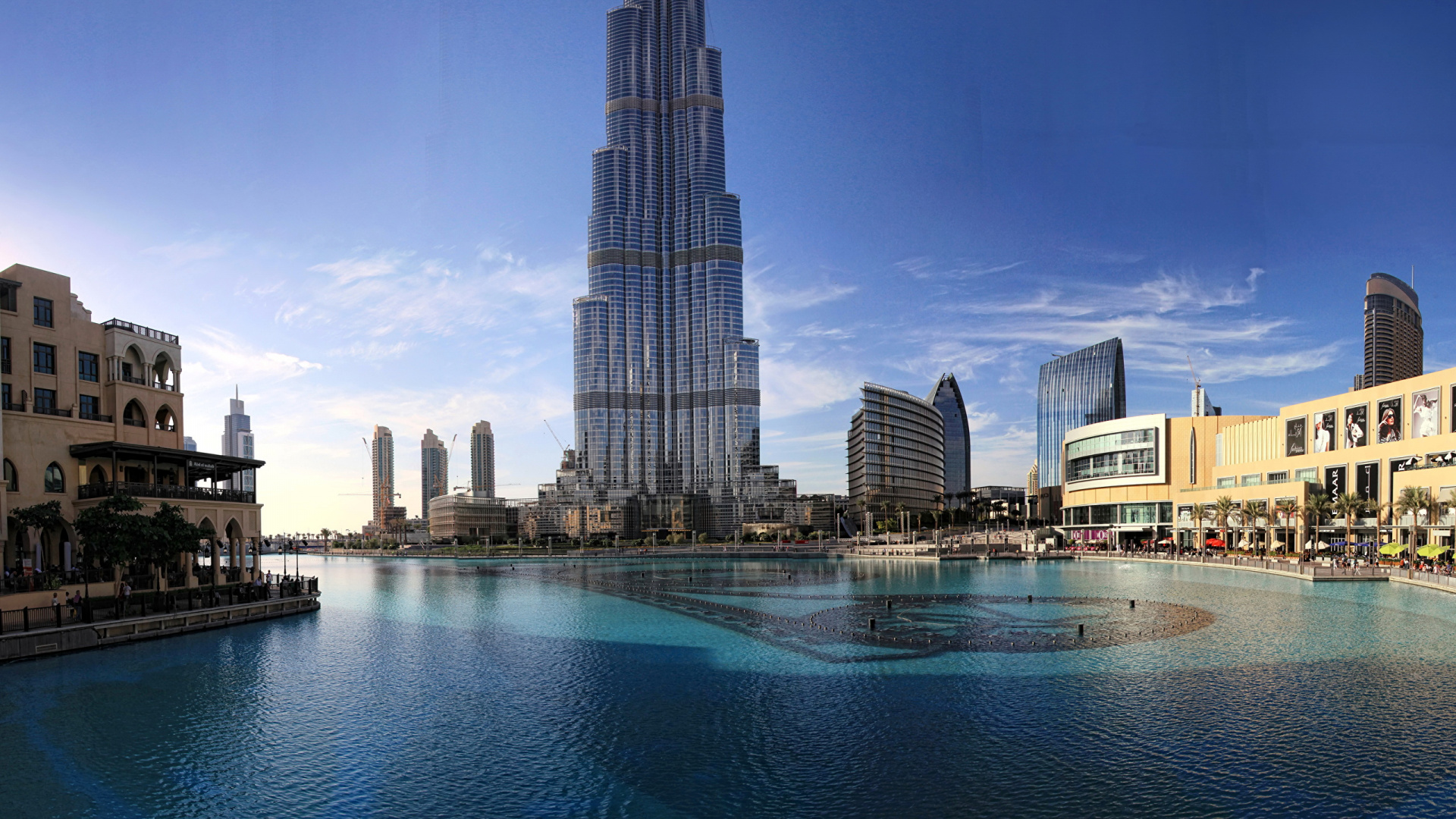 City Skyline Across Body of Water During Daytime. Wallpaper in 1920x1080 Resolution