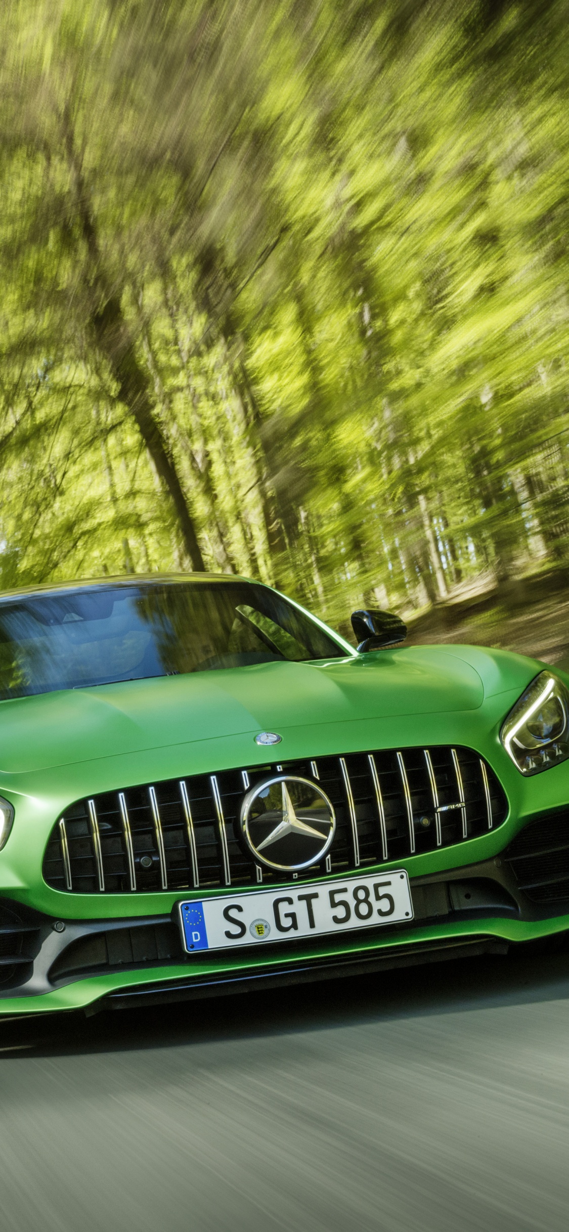 Green Mercedes Benz Car on Road During Daytime. Wallpaper in 1125x2436 Resolution
