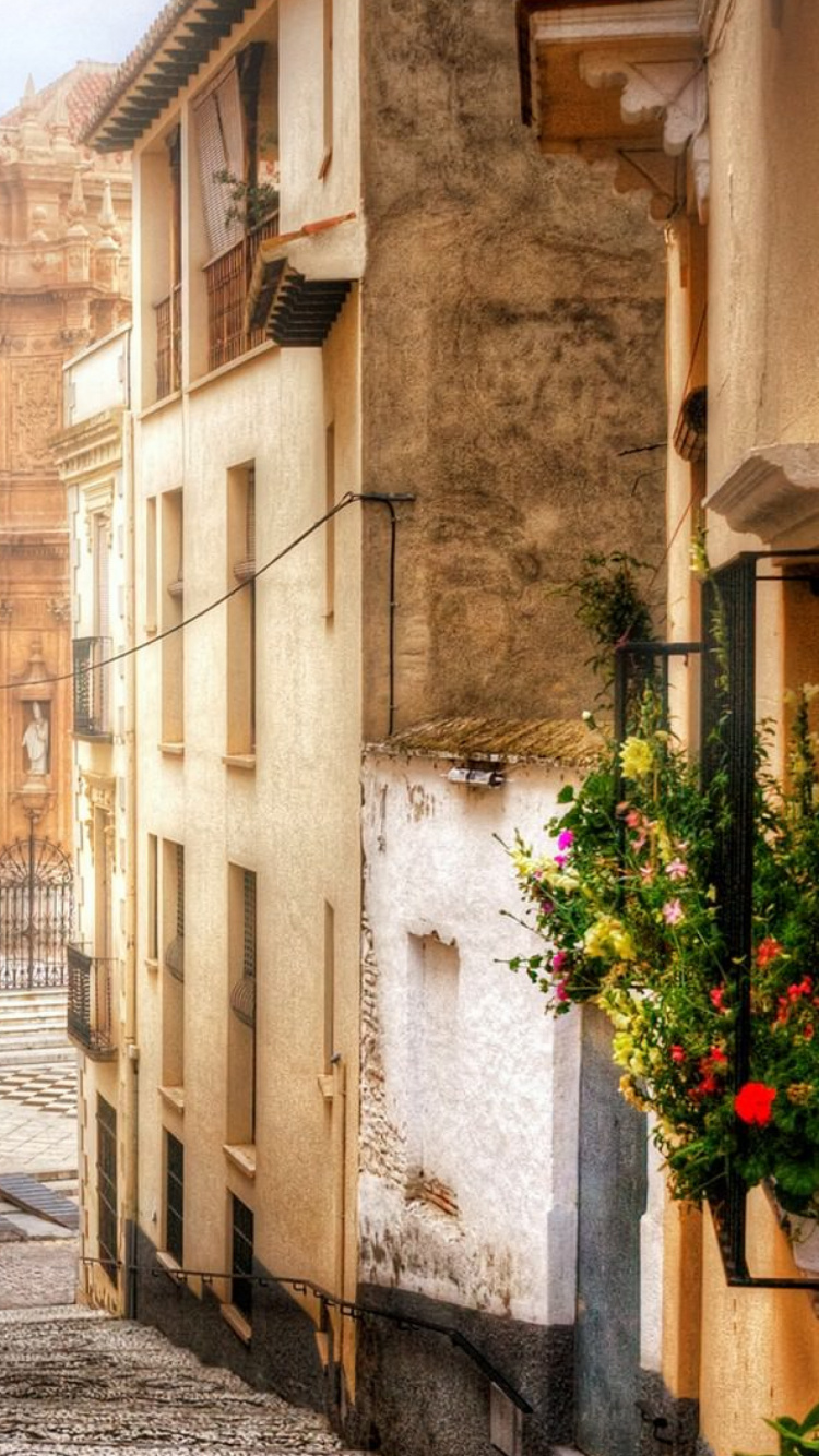 Edificio de Hormigón Marrón y Beige Durante el Día.. Wallpaper in 750x1334 Resolution