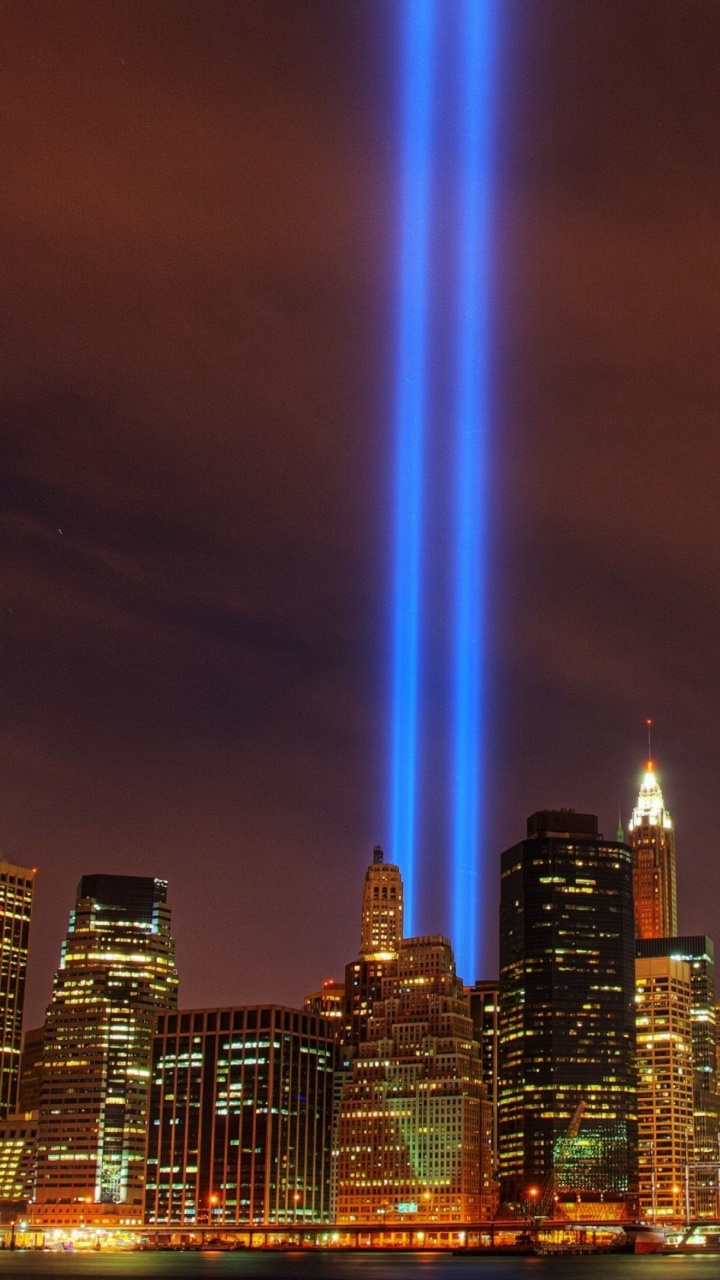 City Skyline During Night Time. Wallpaper in 720x1280 Resolution