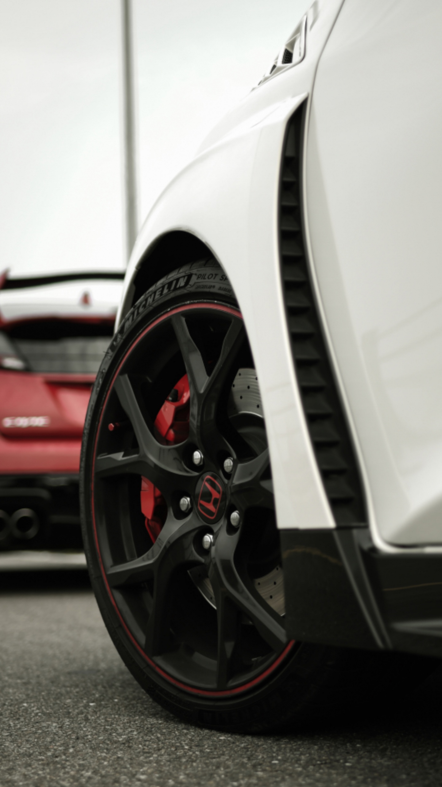 White Car on Gray Asphalt Road. Wallpaper in 1440x2560 Resolution