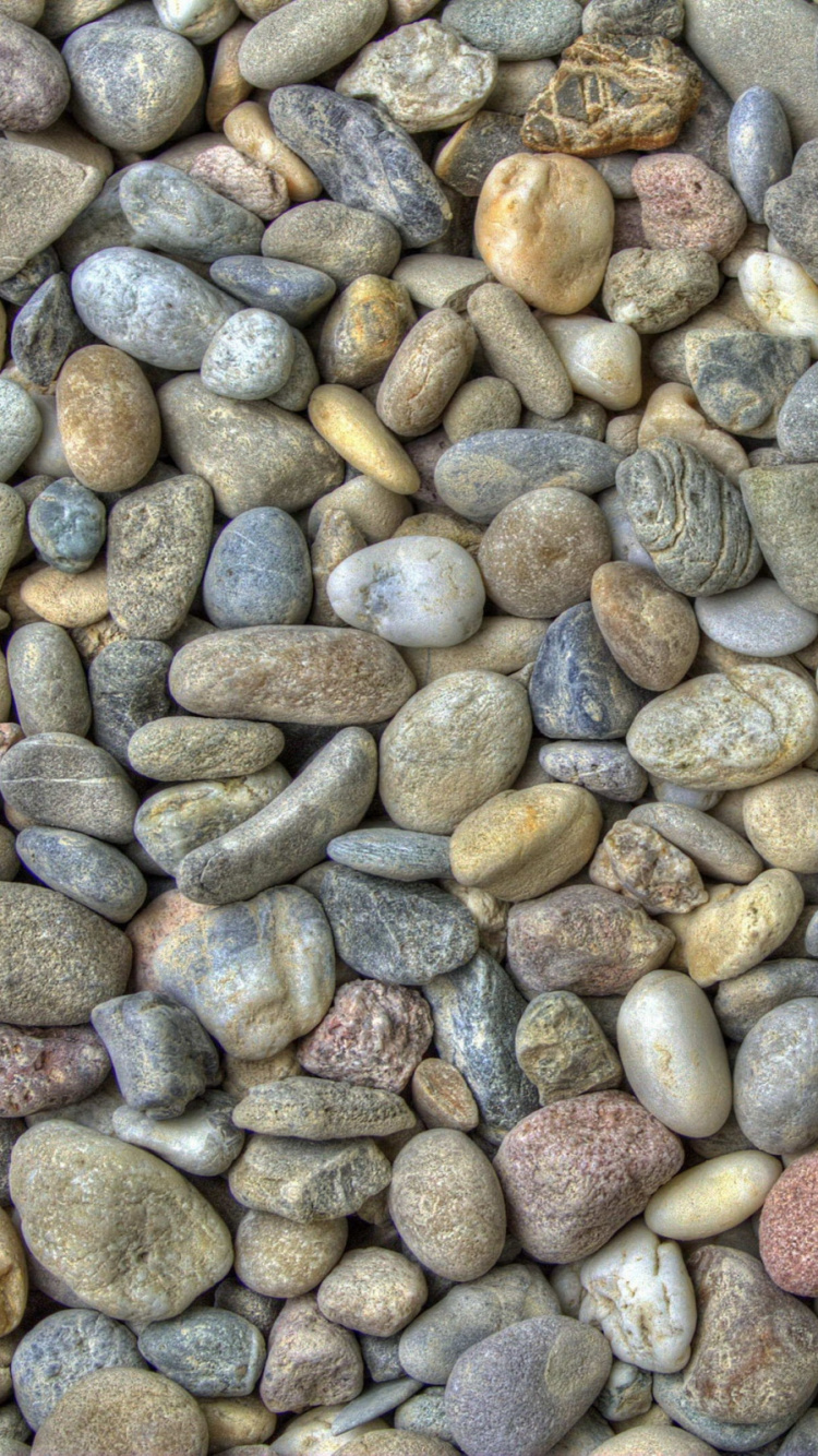 Braune Und Graue Steine Auf Grauen Und Braunen Steinen. Wallpaper in 750x1334 Resolution