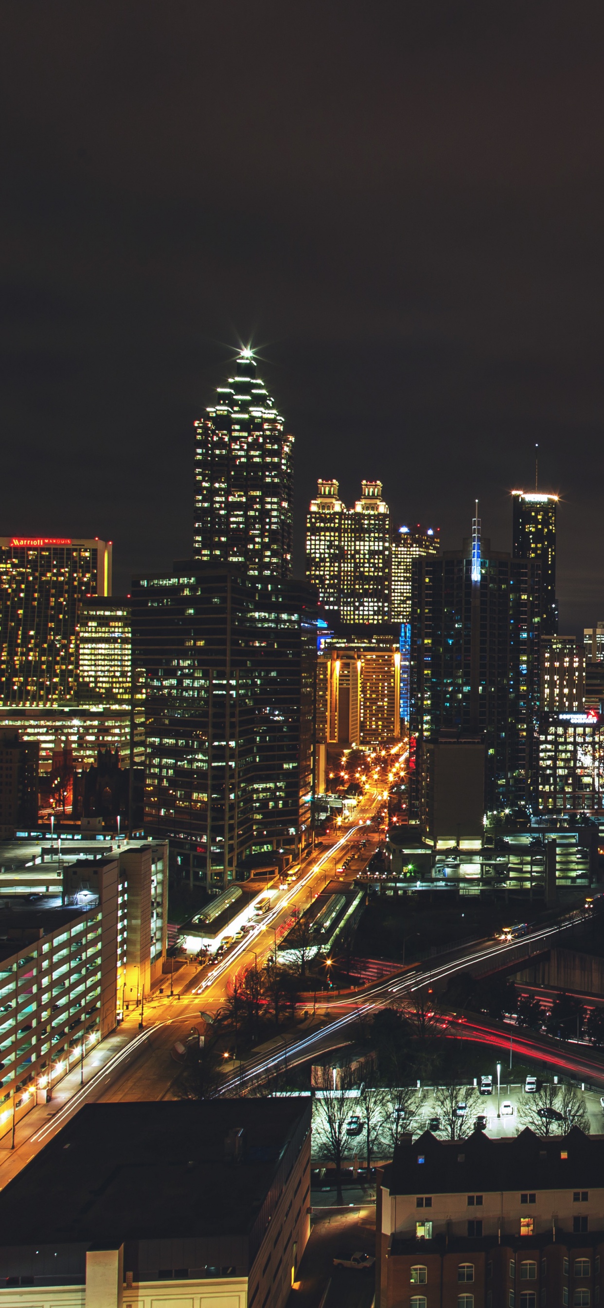 City Buildings During Night Time. Wallpaper in 1242x2688 Resolution