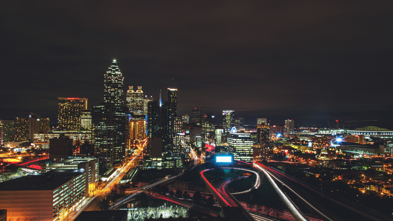 City Buildings During Night Time. Wallpaper in 1366x768 Resolution