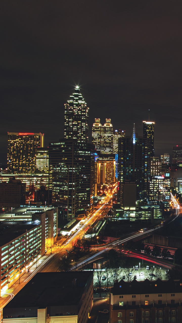 City Buildings During Night Time. Wallpaper in 720x1280 Resolution