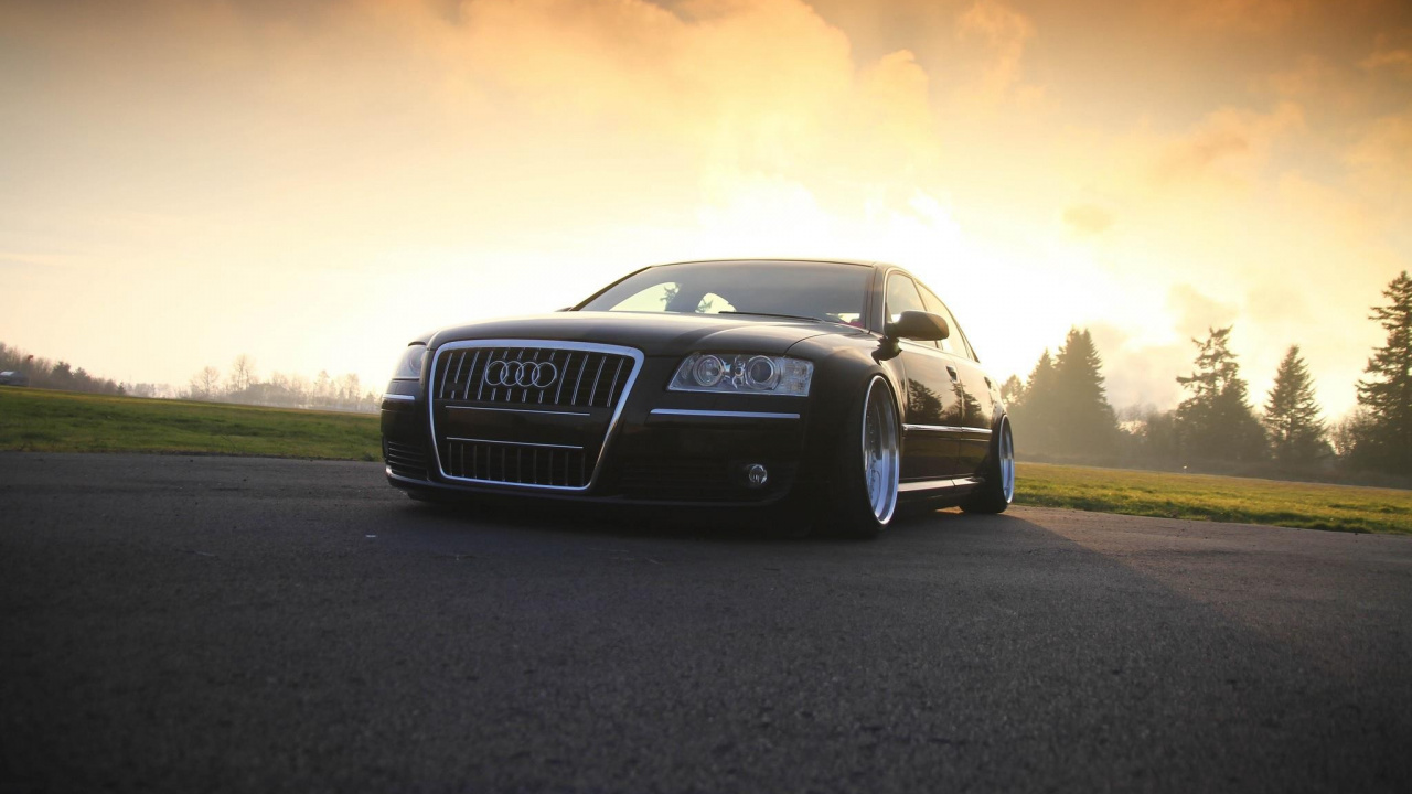 Schwarzer Bmw m 3 Unterwegs Bei Sonnenuntergang. Wallpaper in 1280x720 Resolution