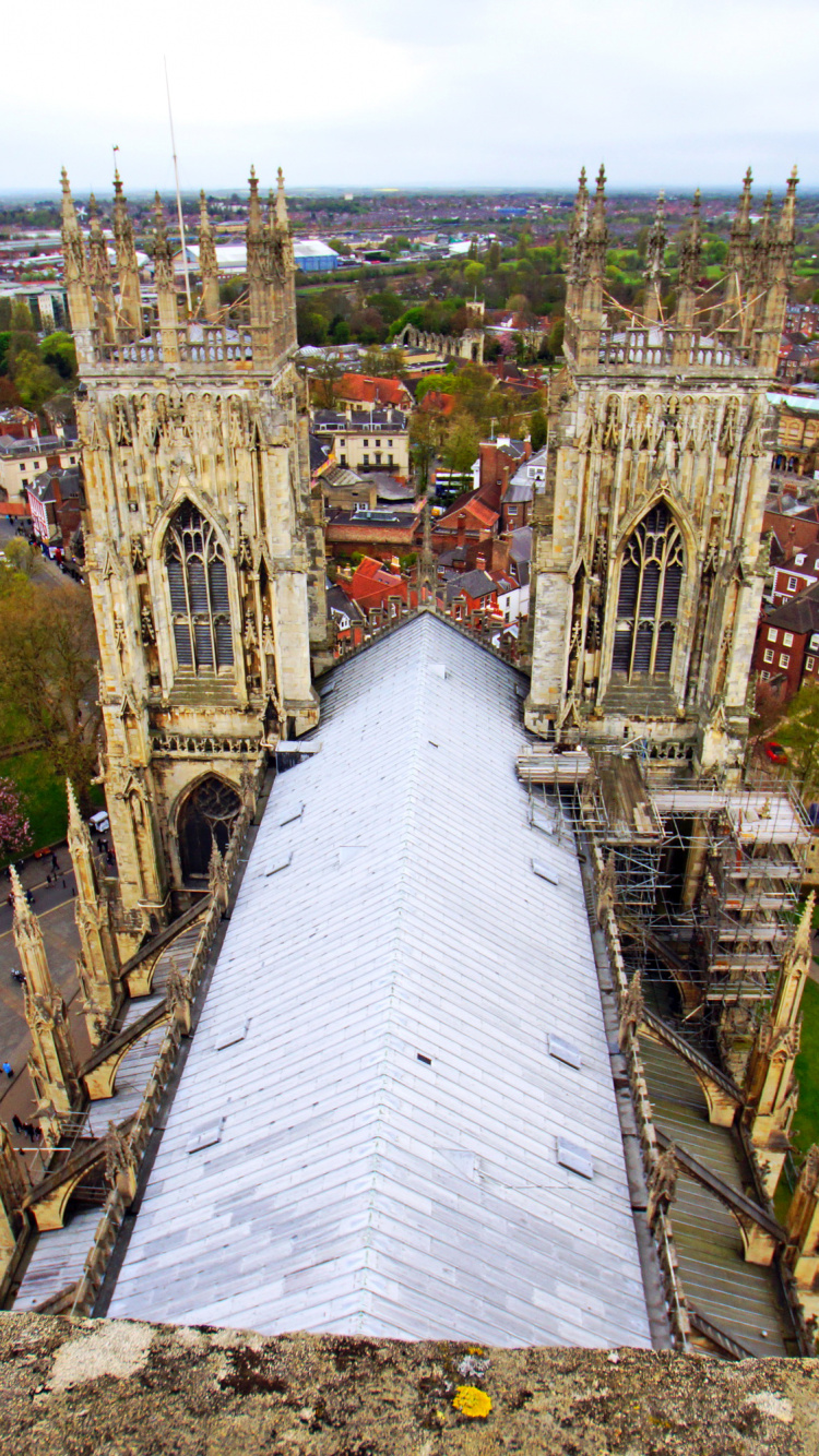 White and Brown Concrete Building. Wallpaper in 750x1334 Resolution