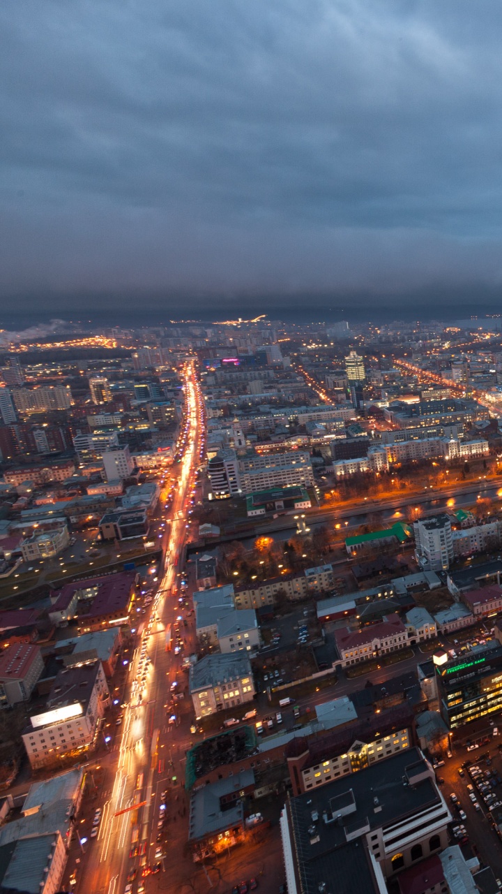 Aerial View of City Buildings During Night Time. Wallpaper in 720x1280 Resolution