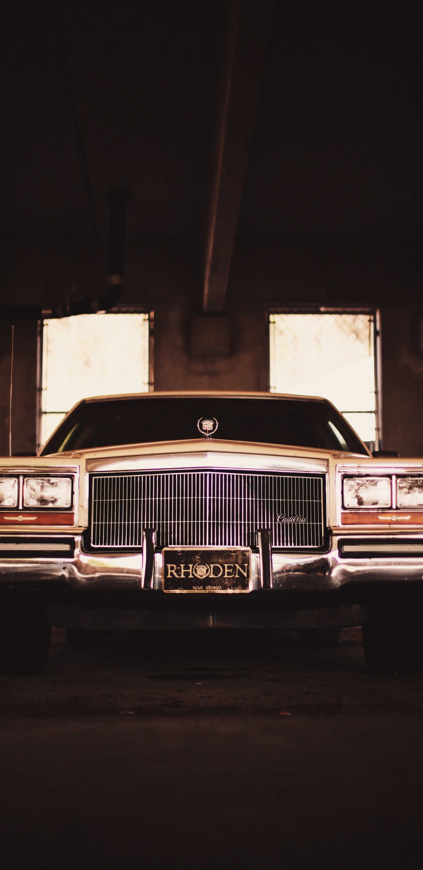 Classic Brown Car in a Garage. Wallpaper in 1440x2960 Resolution