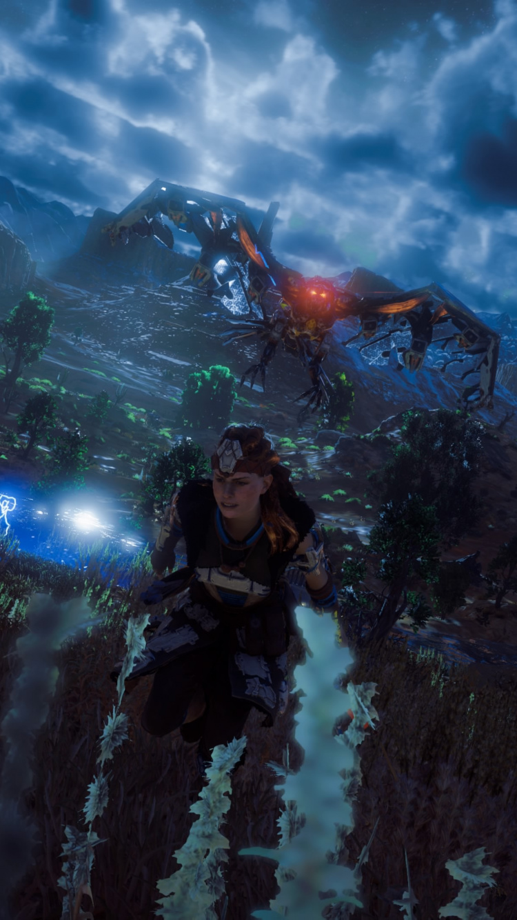 Man in Black Jacket Standing on Rock. Wallpaper in 750x1334 Resolution