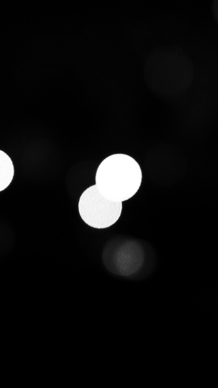 White and Black Bokeh Lights. Wallpaper in 750x1334 Resolution