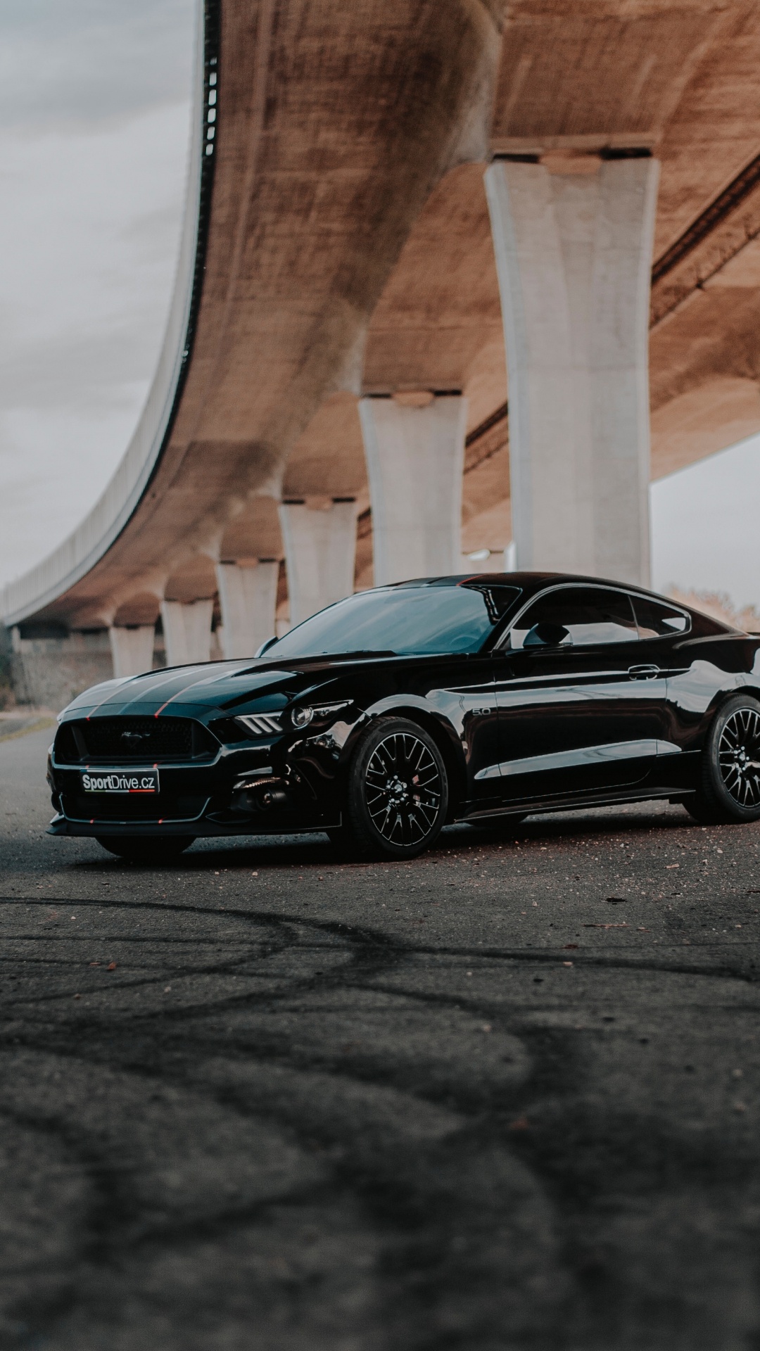 Black Mercedes Benz Coupe Parked on Gray Concrete Road During Daytime. Wallpaper in 1080x1920 Resolution