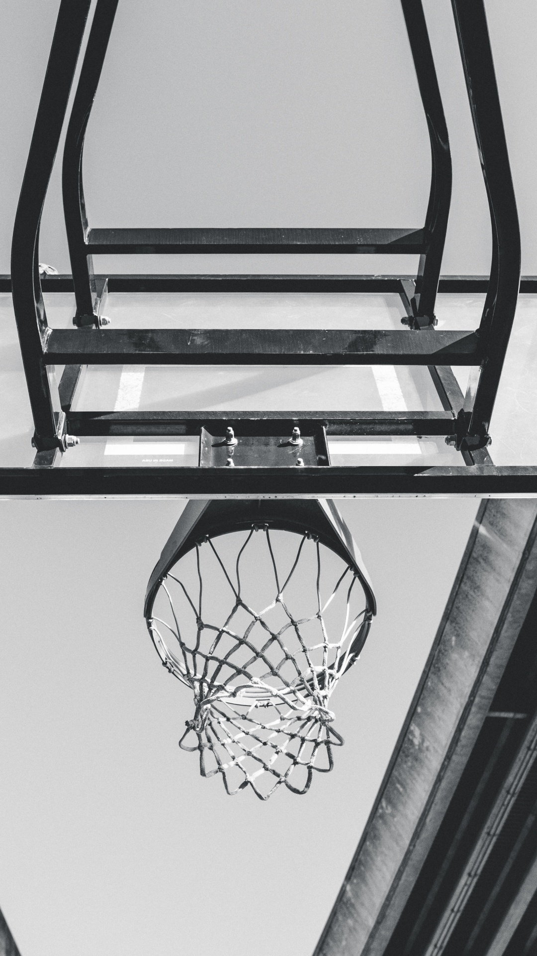 Black Basketball Hoop on White Wall. Wallpaper in 1080x1920 Resolution