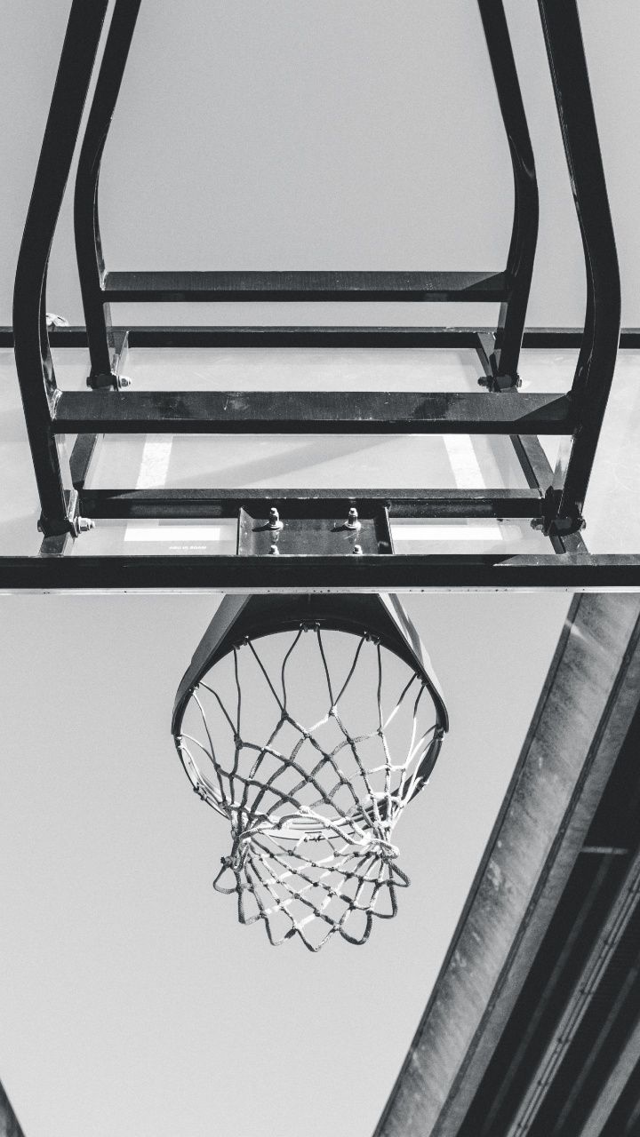 Black Basketball Hoop on White Wall. Wallpaper in 720x1280 Resolution