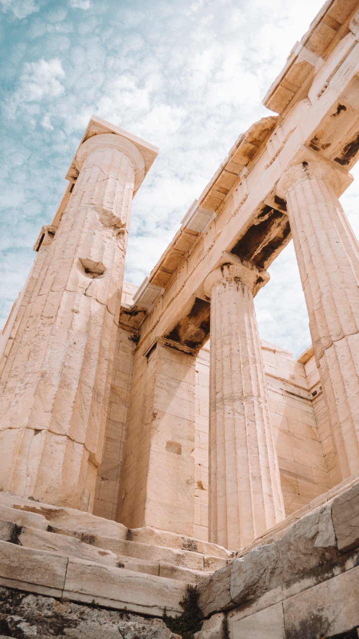 Brown Concrete Building Under Blue Sky During Daytime. Wallpaper in 720x1280 Resolution