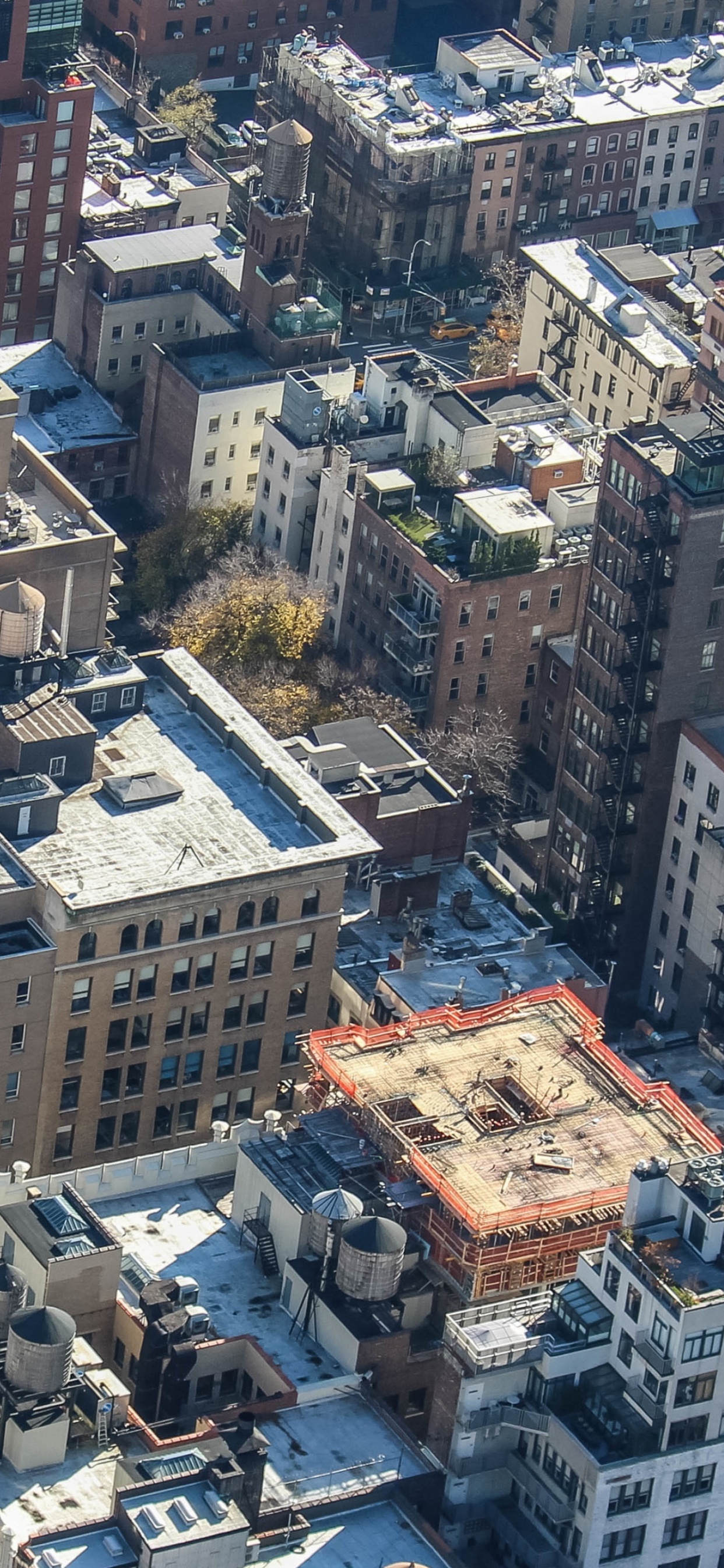 Aerial View of City Buildings During Daytime. Wallpaper in 1242x2688 Resolution