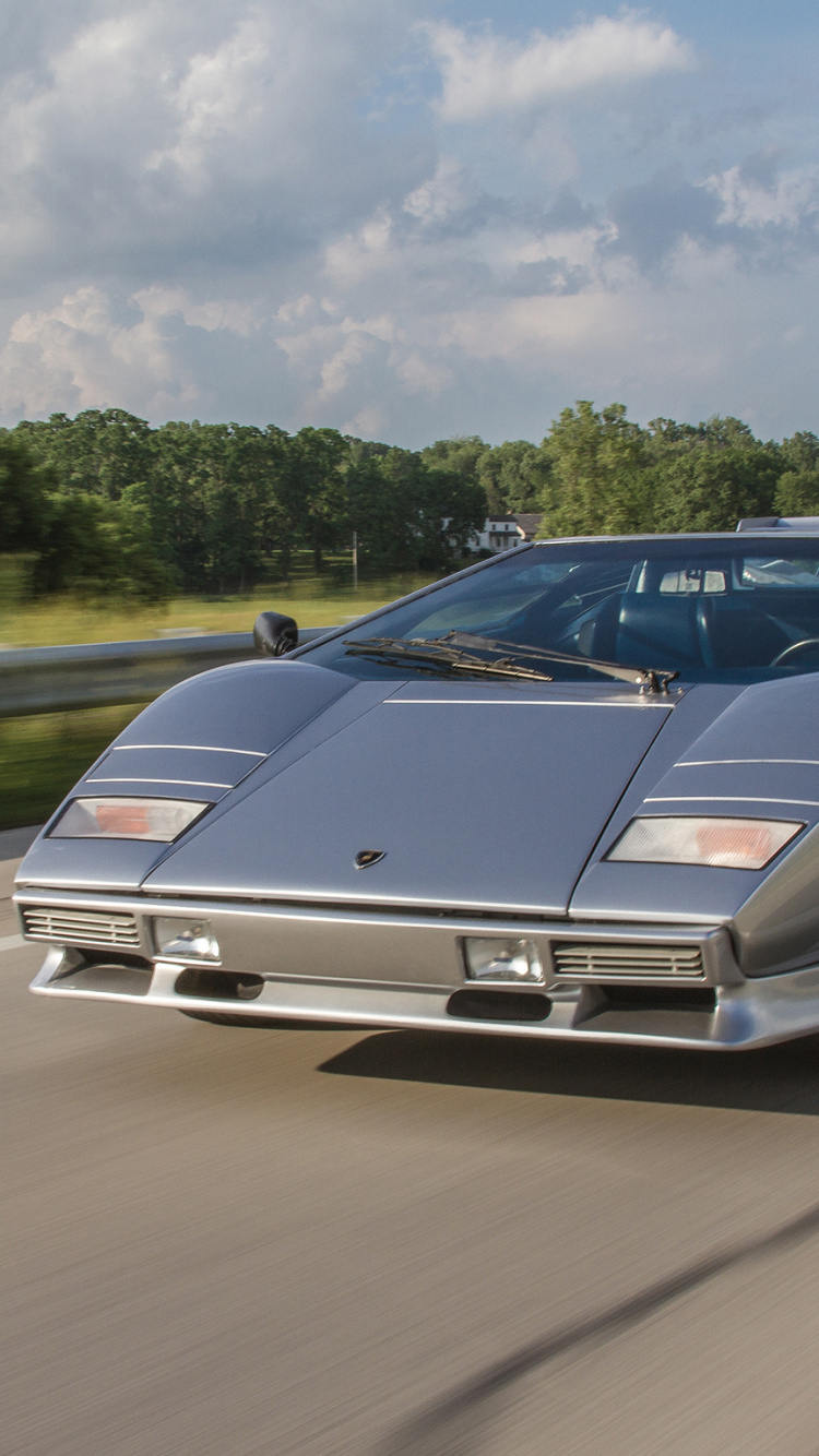 Silver Coupe on Road During Daytime. Wallpaper in 750x1334 Resolution