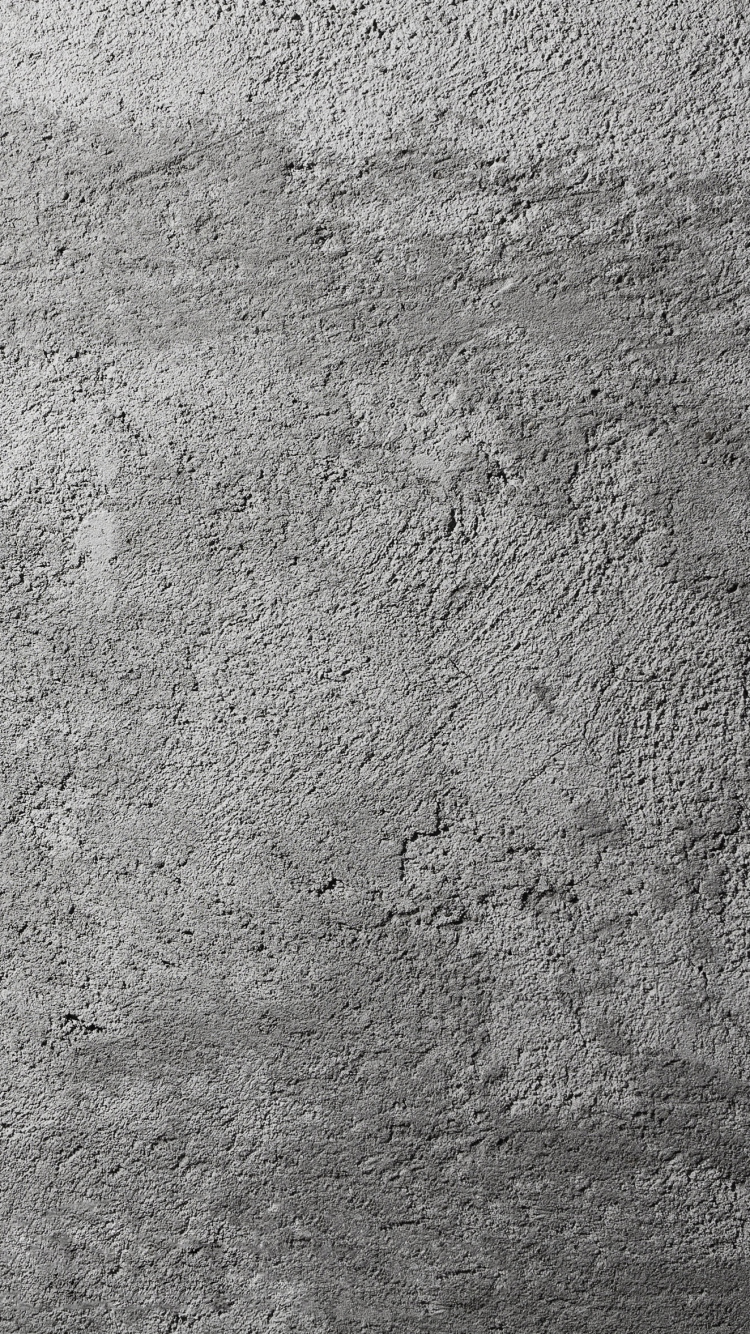 Gray Textile on Gray Concrete Floor. Wallpaper in 750x1334 Resolution