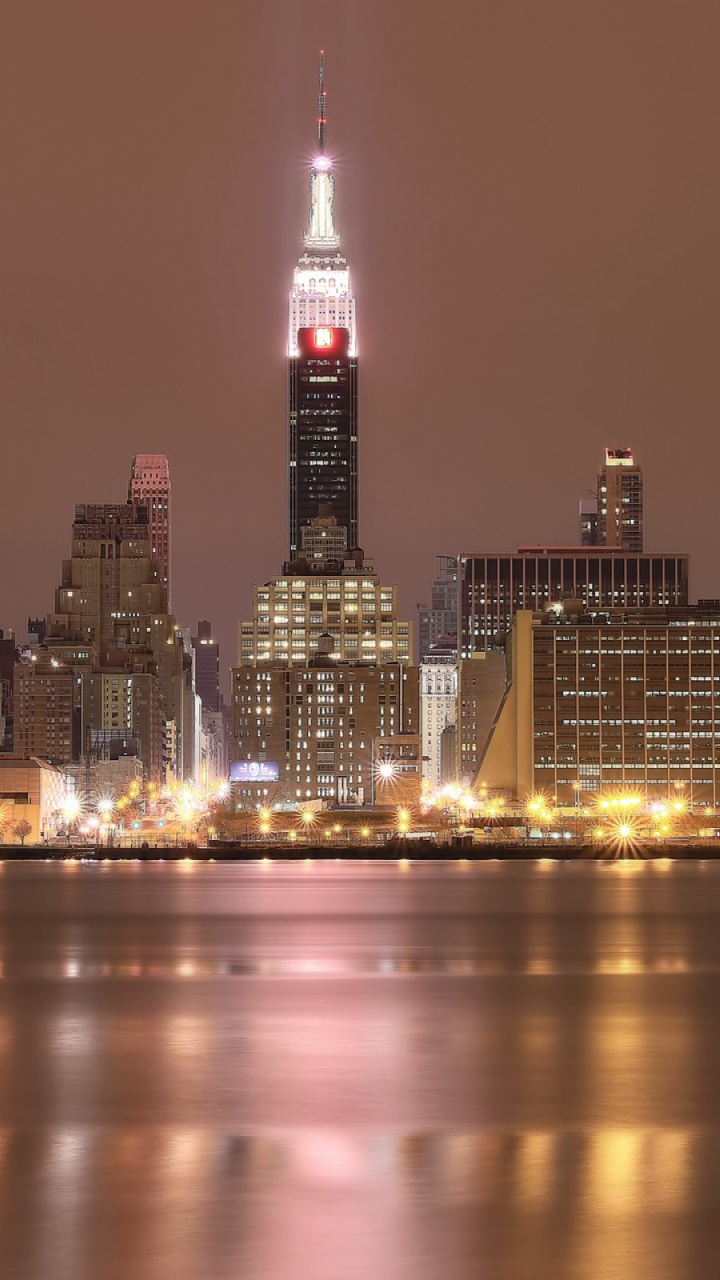 City Skyline During Night Time. Wallpaper in 720x1280 Resolution