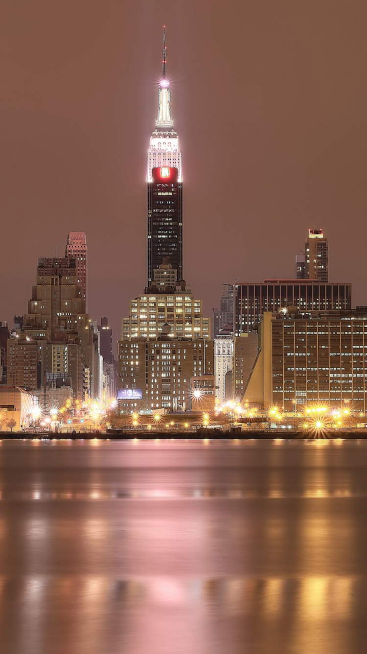 City Skyline During Night Time. Wallpaper in 750x1334 Resolution