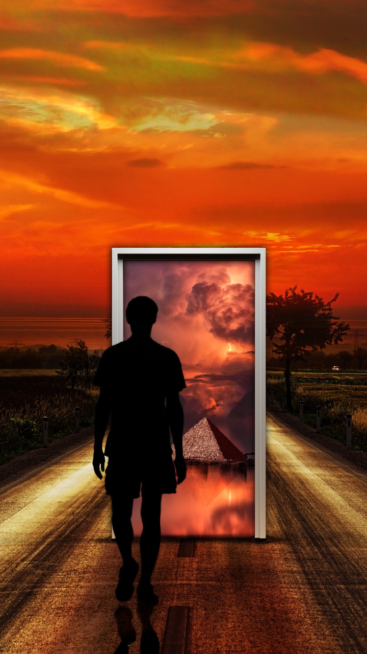 Man in Black Jacket Walking on Road During Sunset. Wallpaper in 720x1280 Resolution