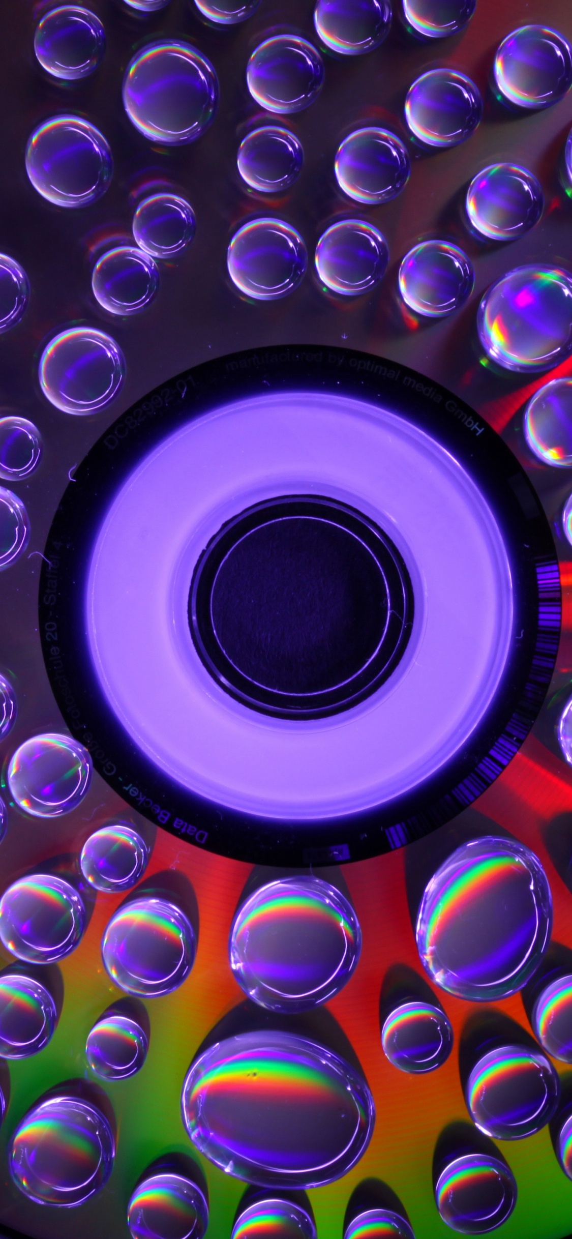 Data Storage Device, DVD, Circle, Technology, Colorfulness. Wallpaper in 1125x2436 Resolution