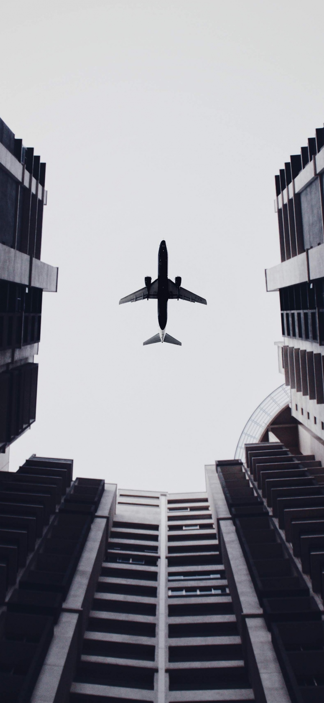 Black and Gray Building During Daytime. Wallpaper in 1125x2436 Resolution