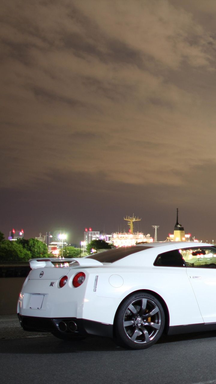 White Coupe on Road During Daytime. Wallpaper in 720x1280 Resolution