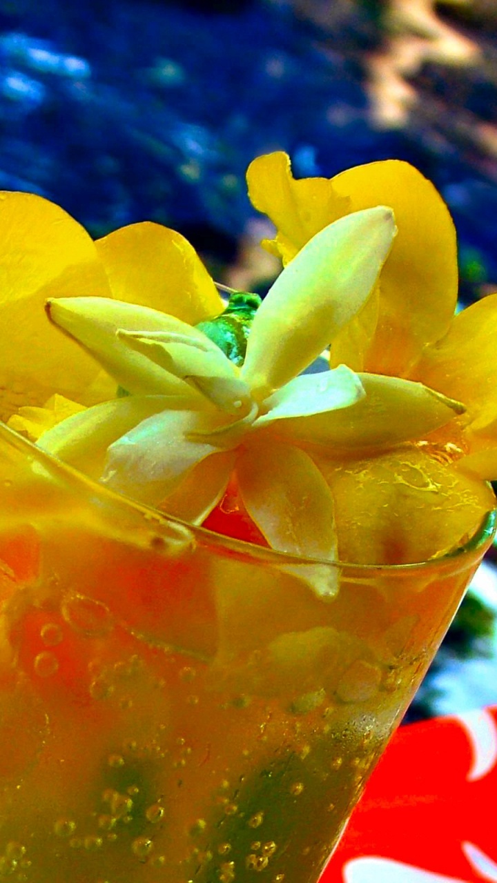 Clear Drinking Glass With Orange Juice. Wallpaper in 720x1280 Resolution