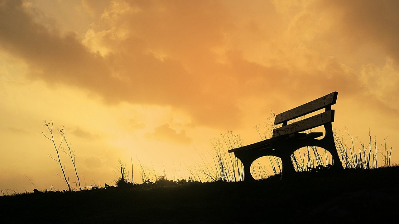 Brown Wooden Bench on Green Grass Field During Sunset. Wallpaper in 1280x720 Resolution