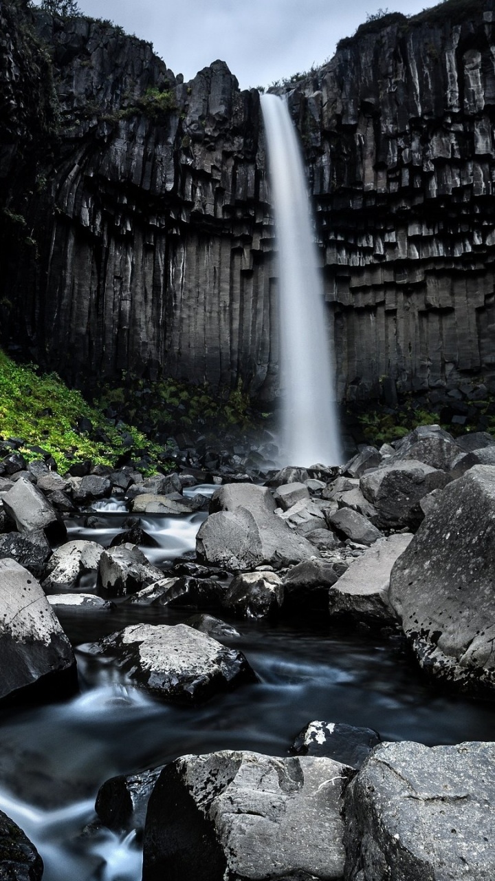 Water Falls in The Middle of Rocky Mountains. Wallpaper in 720x1280 Resolution