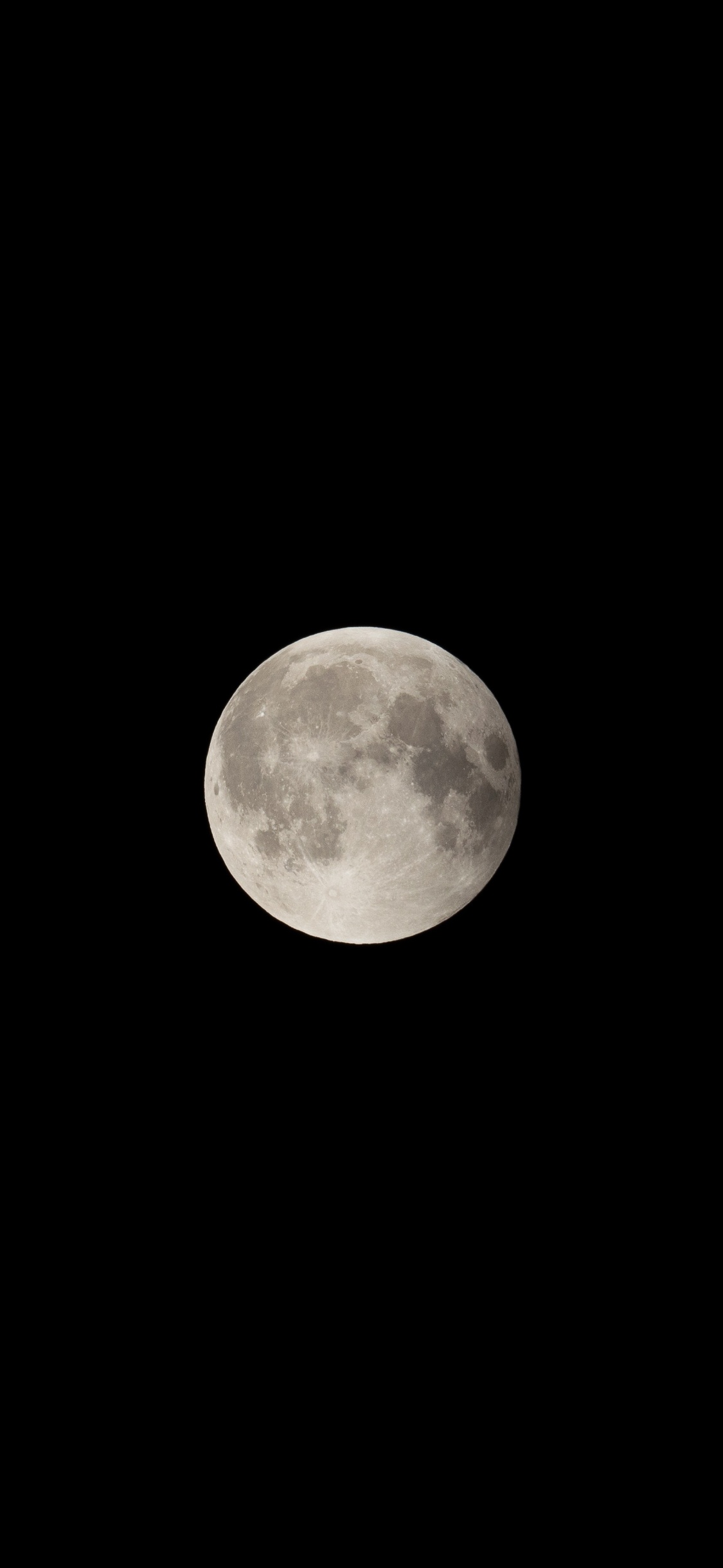 Full Moon in Dark Night Sky. Wallpaper in 1125x2436 Resolution