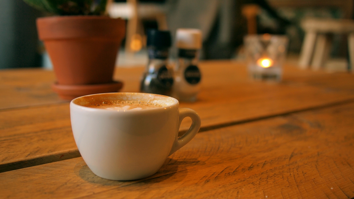 White Ceramic Mug on Brown Wooden Table. Wallpaper in 1366x768 Resolution