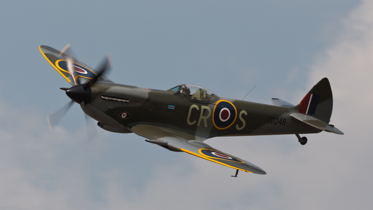 Black and Yellow Jet Plane in Mid Air. Wallpaper in 1280x720 Resolution