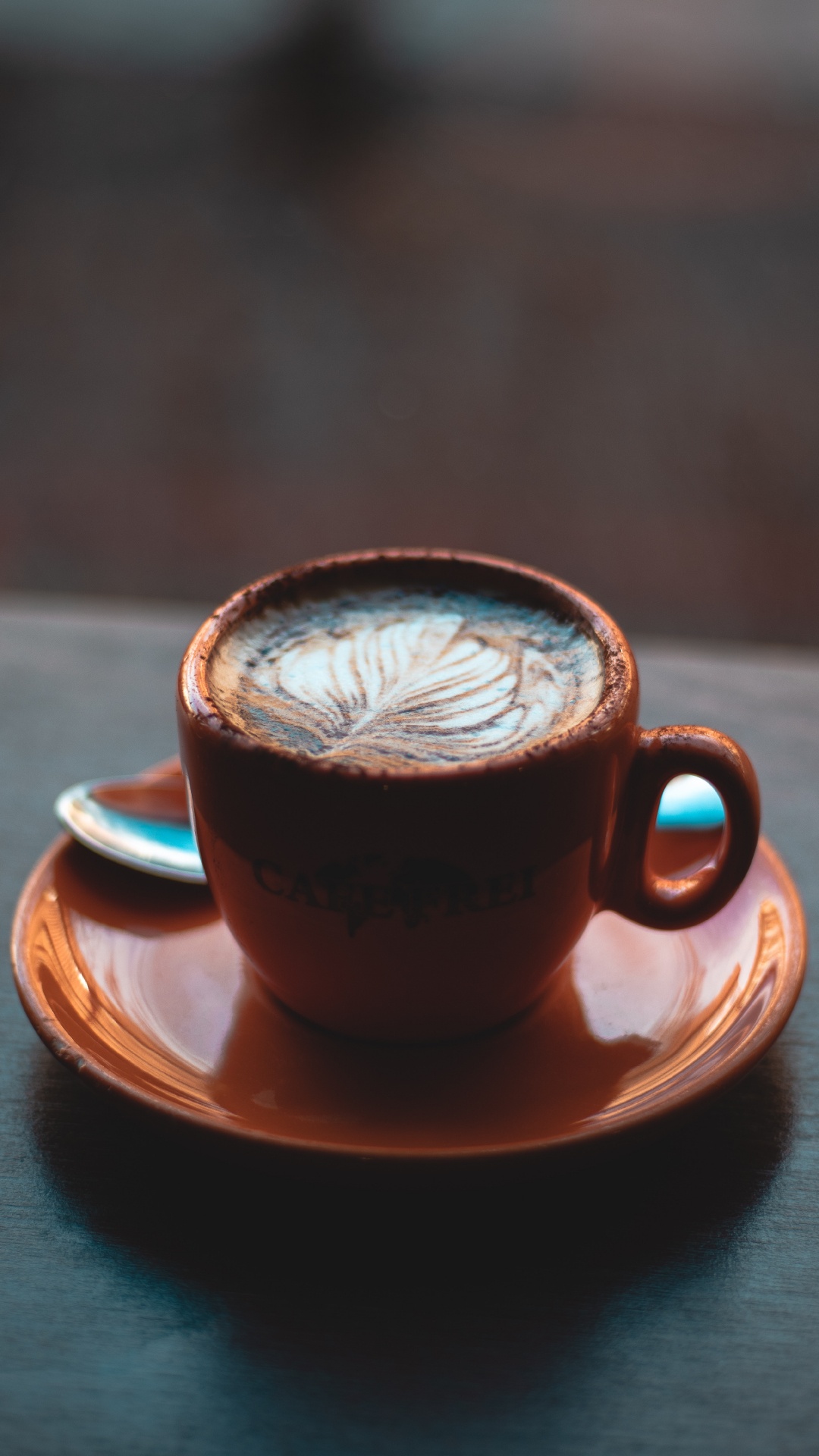 Brown Ceramic Cup With Saucer on Brown Wooden Table. Wallpaper in 1080x1920 Resolution