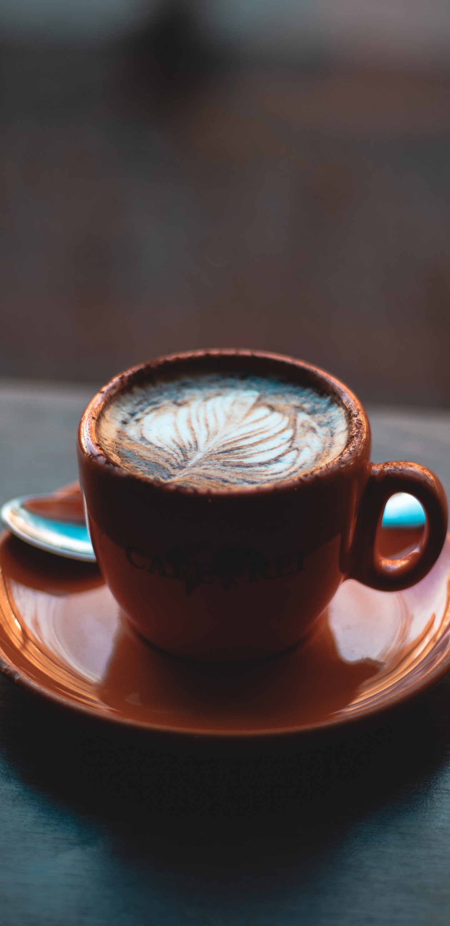 Brown Ceramic Cup With Saucer on Brown Wooden Table. Wallpaper in 1440x2960 Resolution