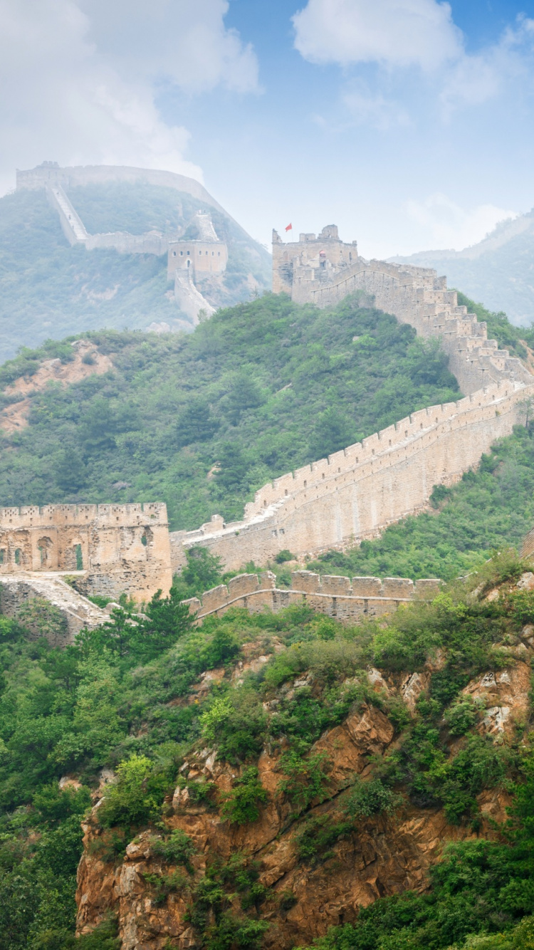 Brown Concrete Building on Mountain. Wallpaper in 750x1334 Resolution