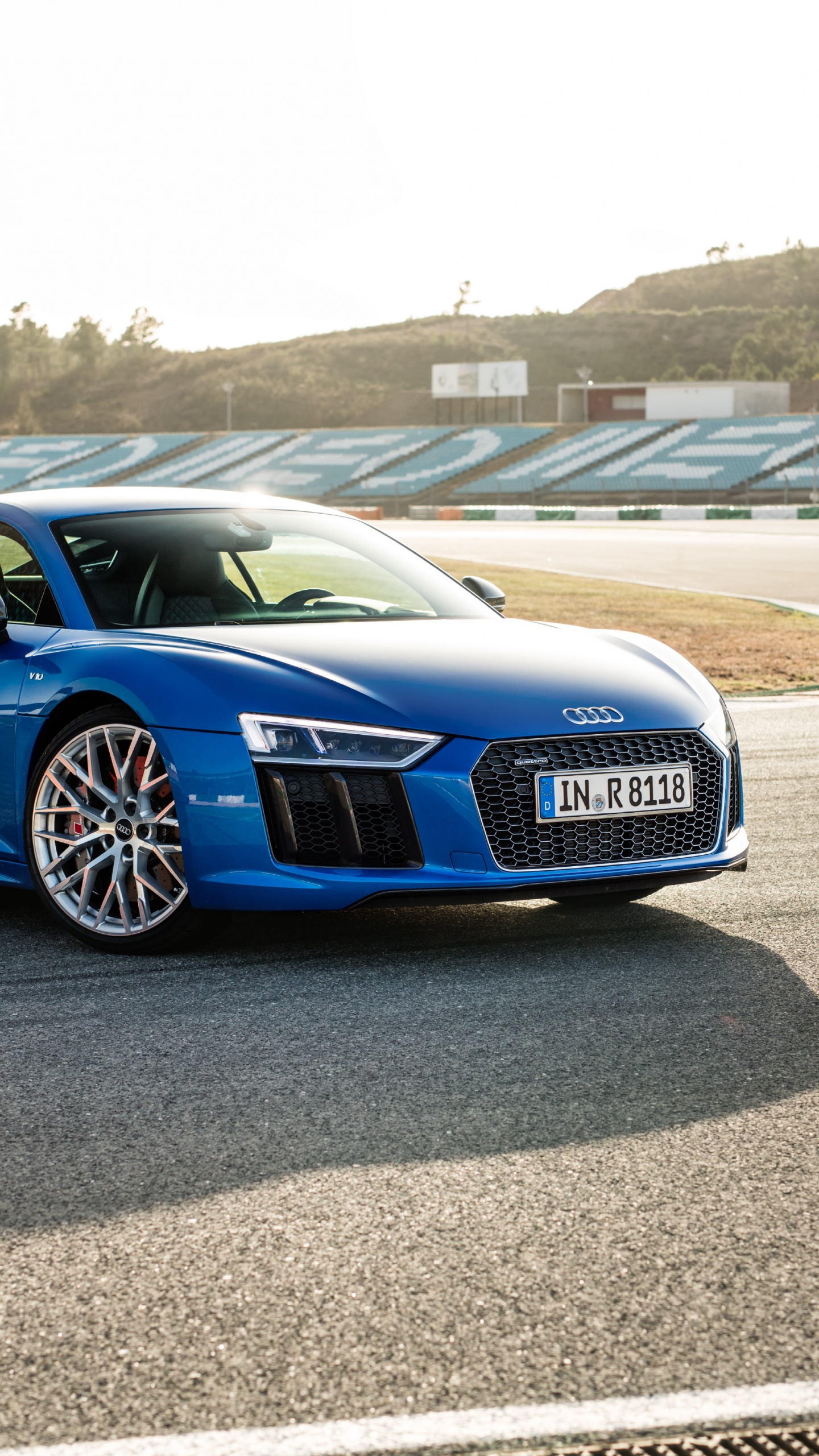 Blue Audi Coupe on Gray Asphalt Road During Daytime. Wallpaper in 1440x2560 Resolution