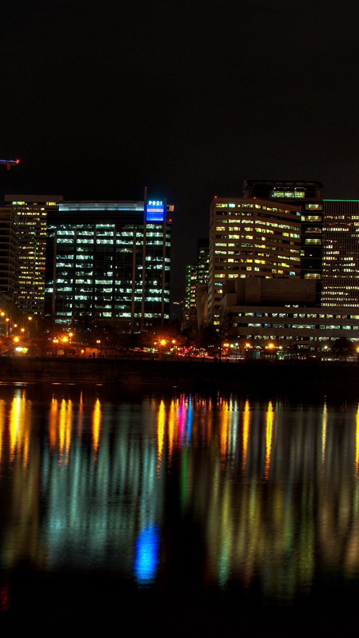 Bridge Over Water During Night Time. Wallpaper in 720x1280 Resolution