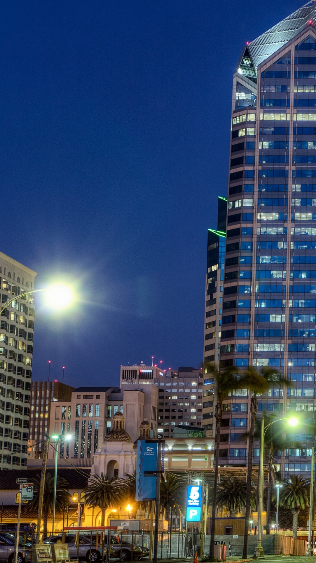 City Buildings With Lights Turned on During Night Time. Wallpaper in 1080x1920 Resolution