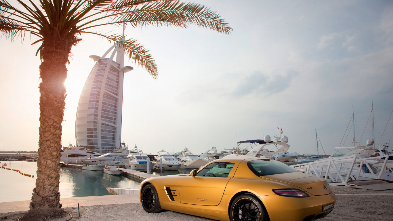 Yellow Coupe Parked Near Body of Water During Daytime. Wallpaper in 1366x768 Resolution