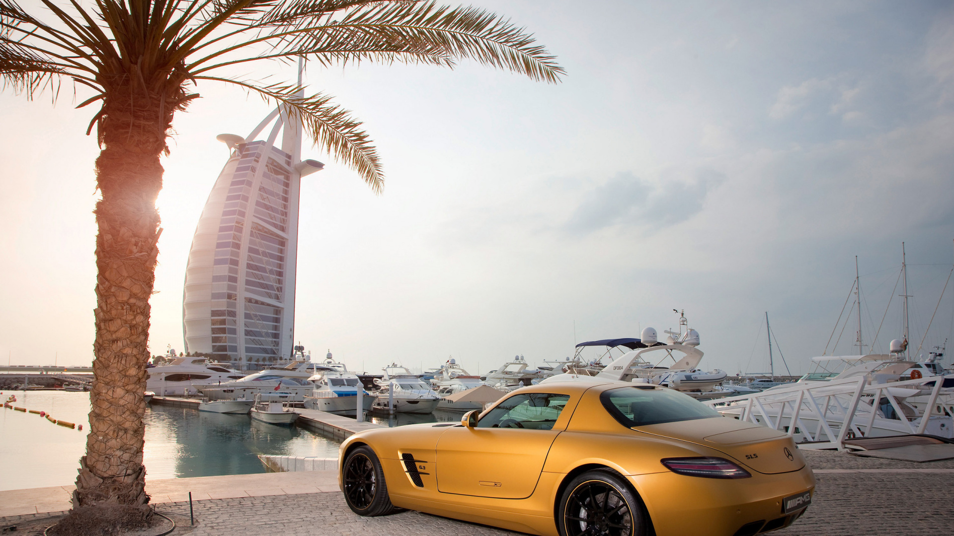 Yellow Coupe Parked Near Body of Water During Daytime. Wallpaper in 1920x1080 Resolution
