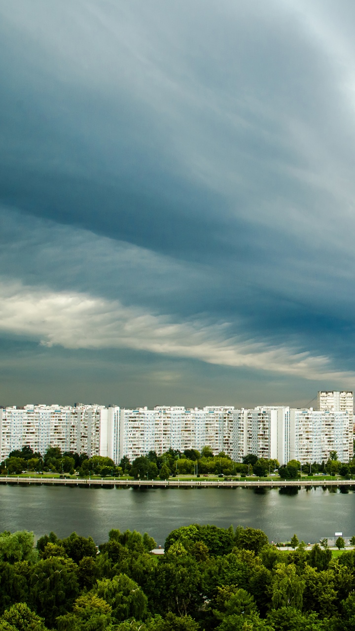 City Skyline Under Cloudy Sky During Daytime. Wallpaper in 720x1280 Resolution