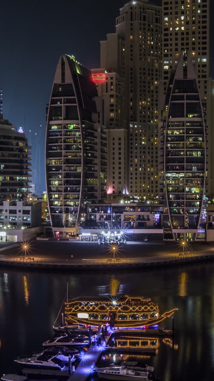City Skyline During Night Time. Wallpaper in 720x1280 Resolution