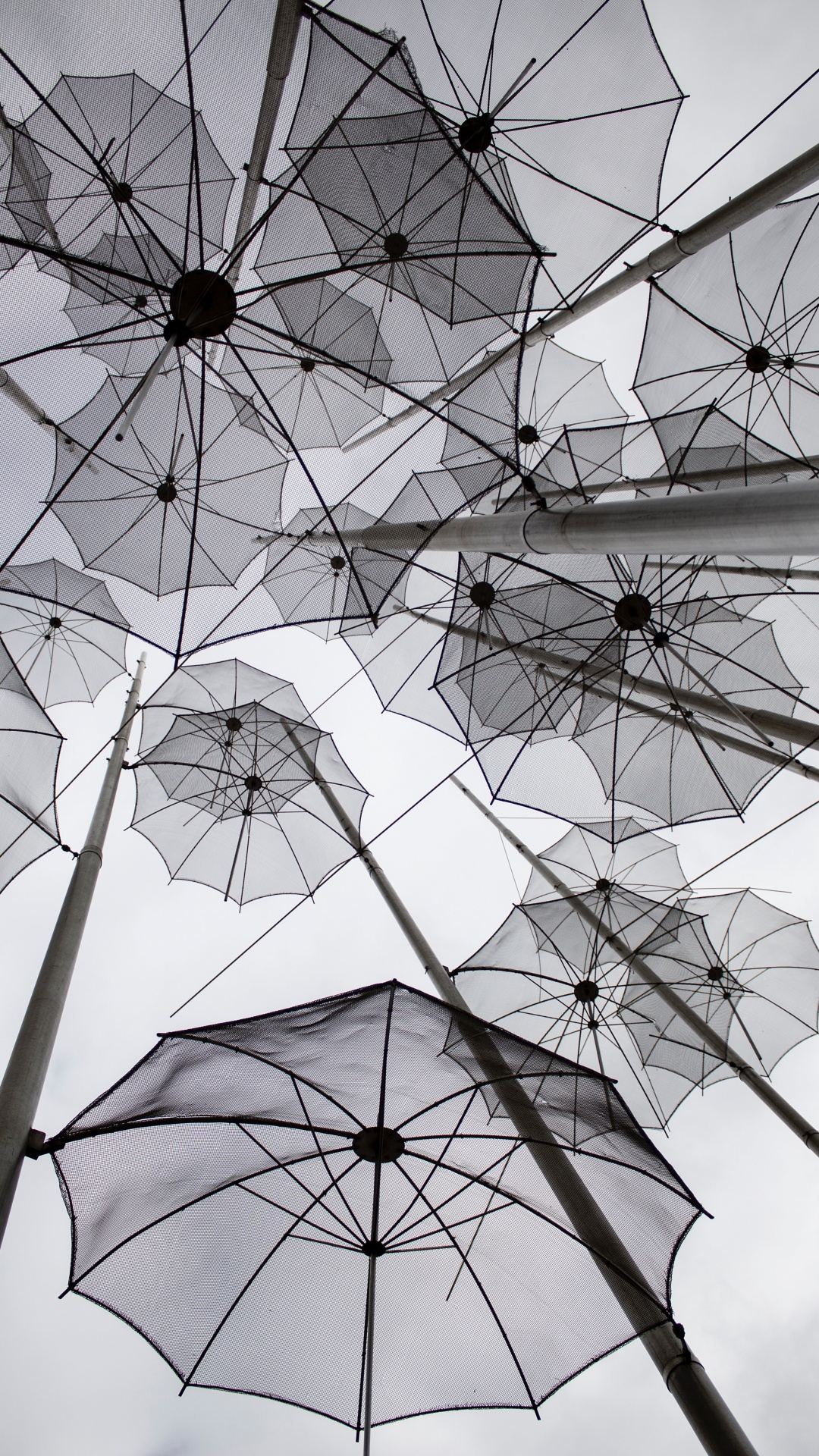 White Umbrellas on Gray Metal Frame. Wallpaper in 1080x1920 Resolution
